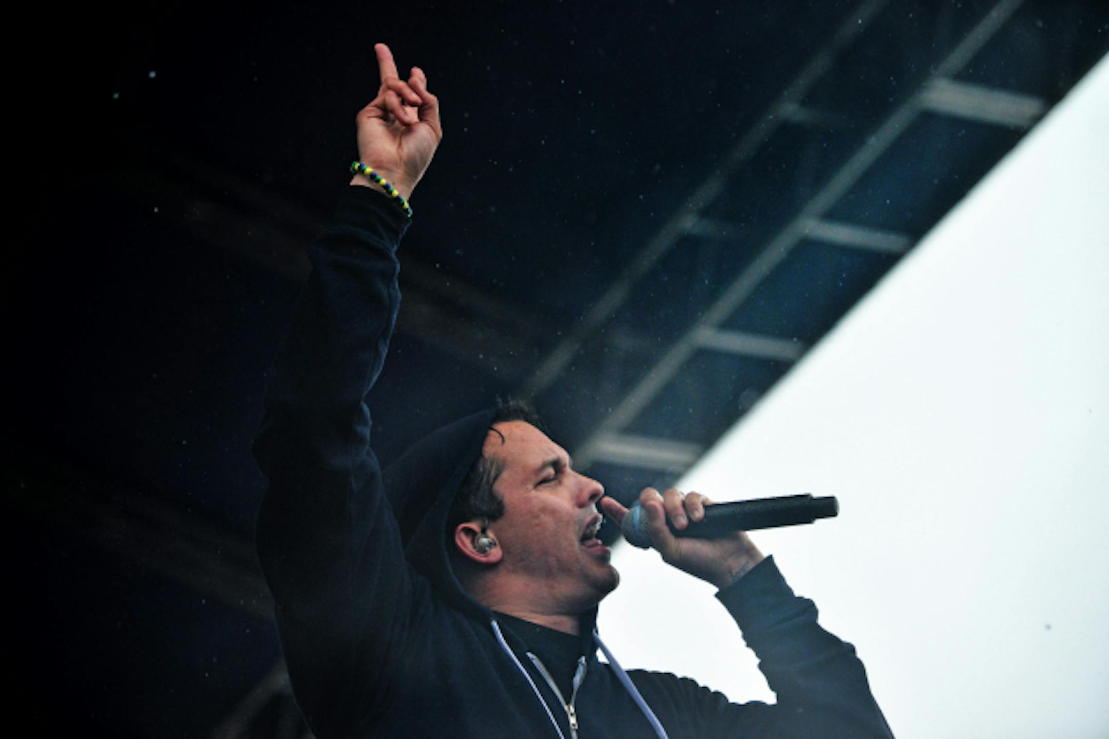 God loves soggy? Slug and Atmosphere performed in the rain at Sunday's Soundset festival, the last one to be held at Canterbury Park. / Mark Vancleave, Star Tribune