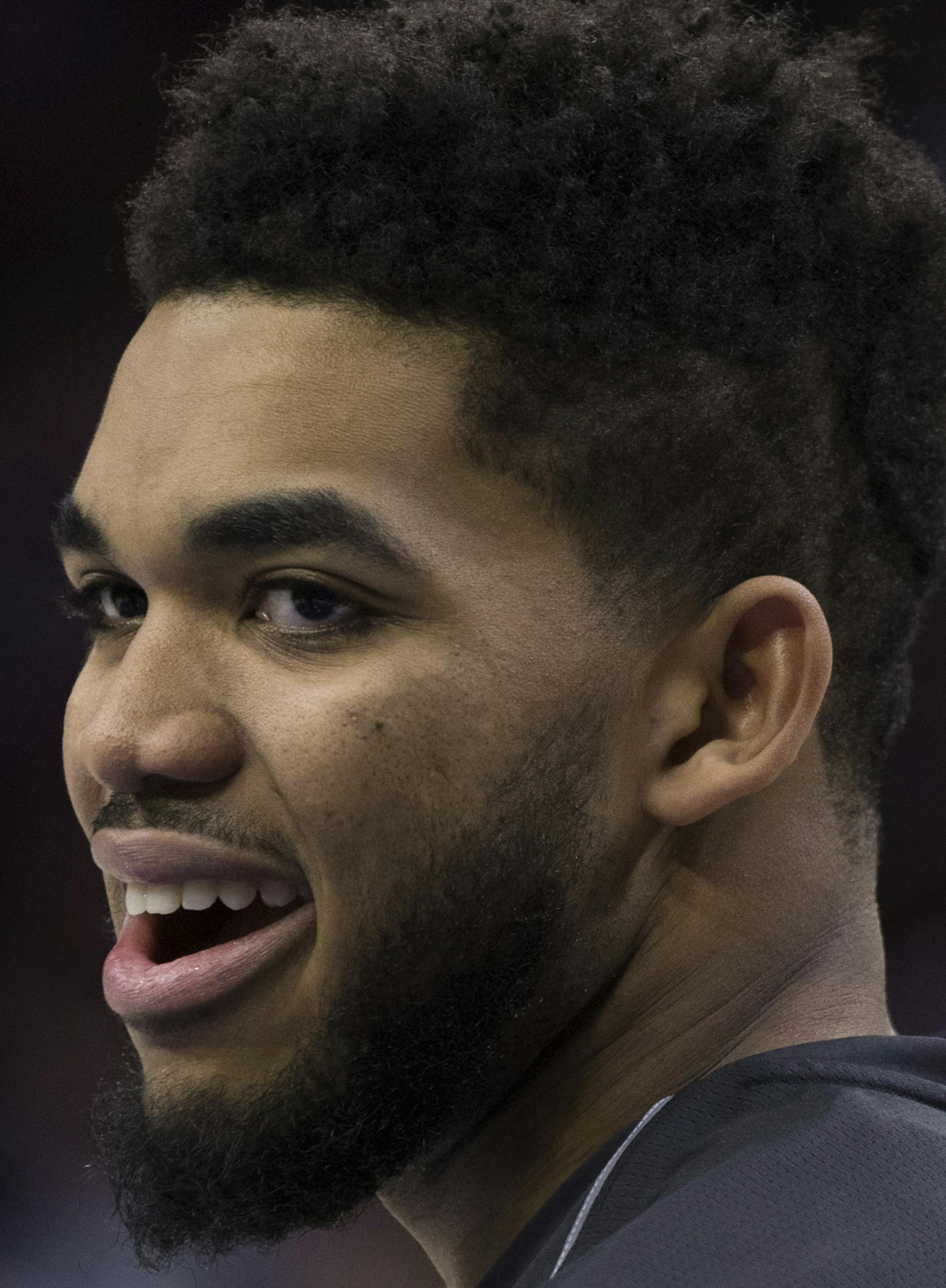 Minnesota Timberwolves' Karl-Anthony Towns looks on prior to the first half of an NBA basketball game against the Philadelphia 76ers, Saturday, March 24, 2018, in Philadelphia. The 76ers won 120-108. (AP Photo/Chris Szagola)