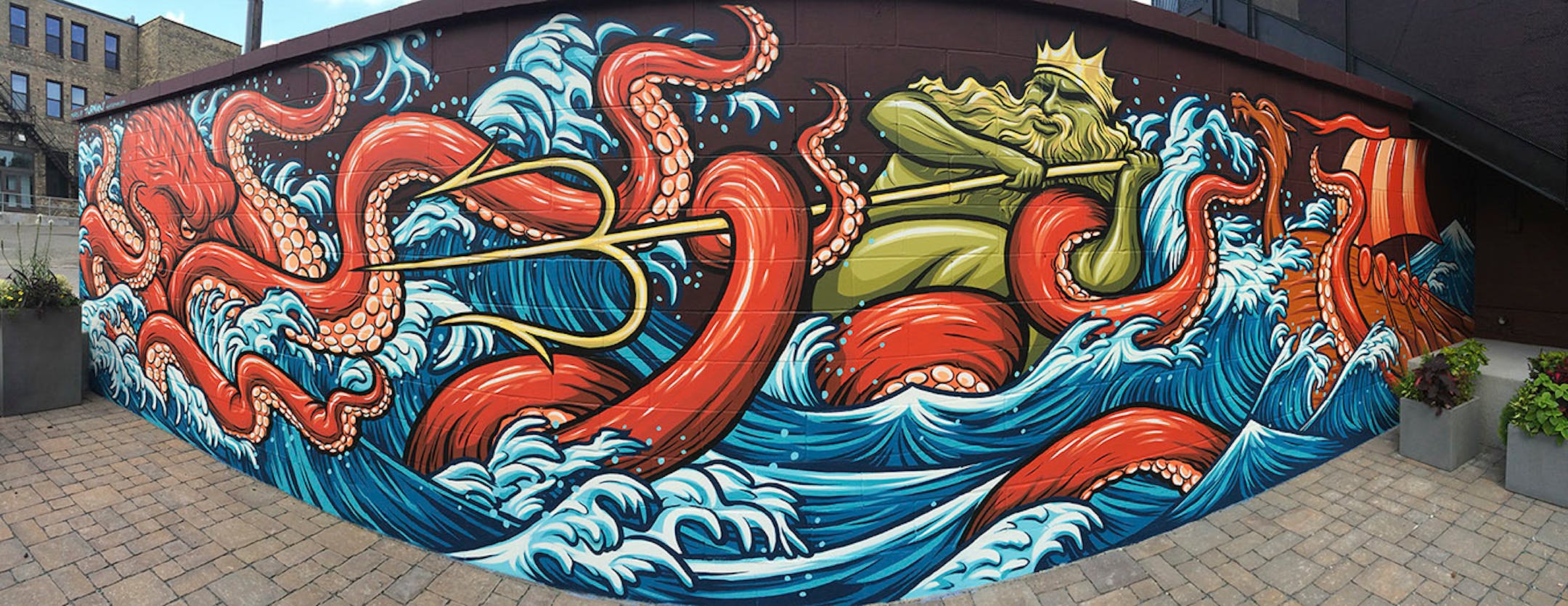The everywhere artist, Adam Turman, His clean, dynamic murals crawl up the sides of breweries, in elementary schools, the lobby of downtown Minneapolis' hip, new hotel. He boasts T-shirts and pint glasses and posters. He's even created a jigsaw puzzle.