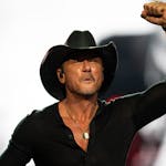 Country music star Tim McGraw pumps his fist while performing at Xcel Energy Center in St. Paul, Minn on Saturday during his Standing Room Only Tour. 