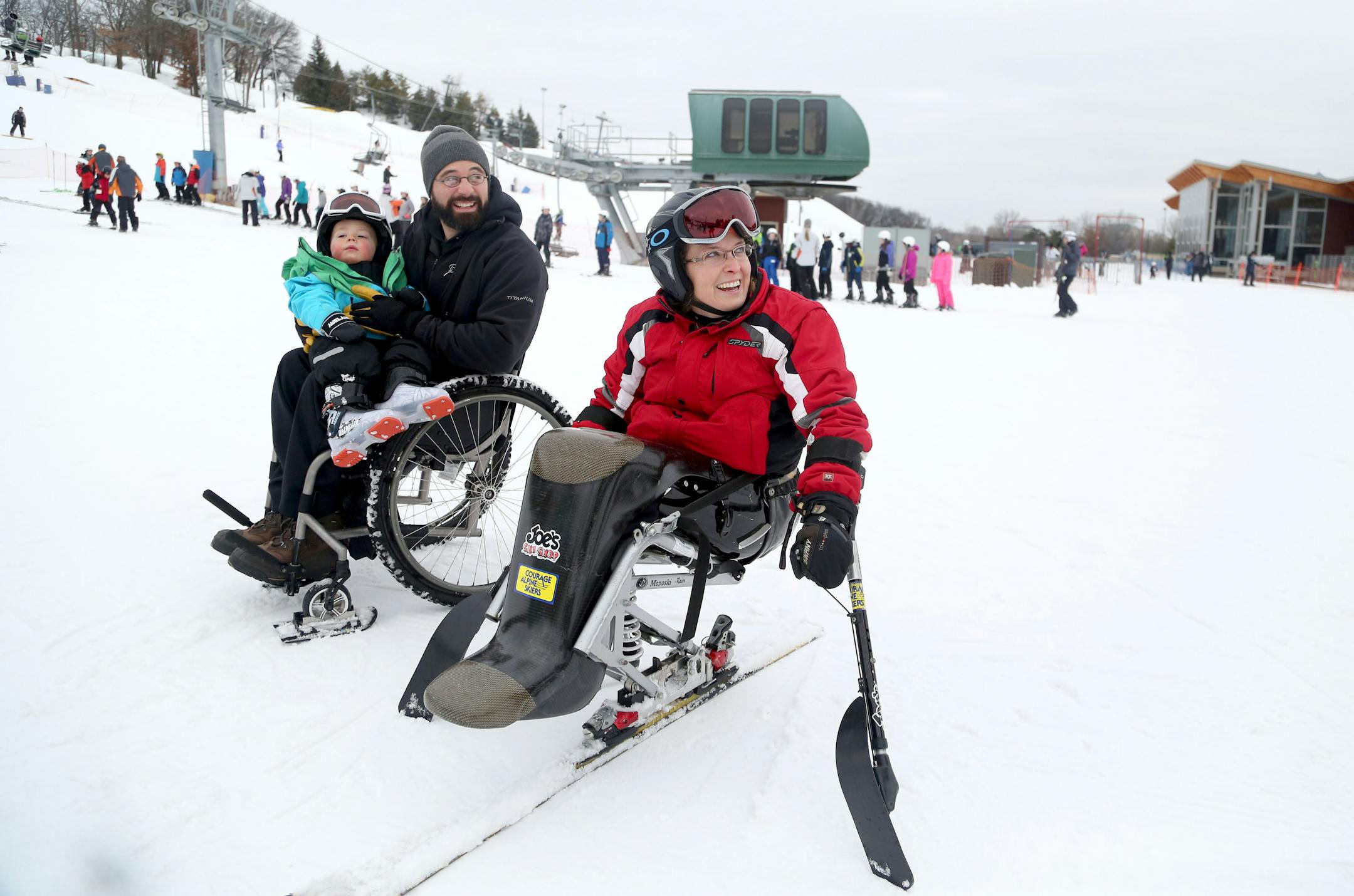 The Tabaka family, from right, mom Tracy, dad Sam with Alex, 2, (and Taylor, not pictured) during a skiing outing at Hyland Hills in Bloomington.