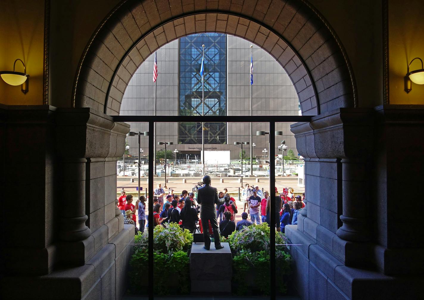 A crowd gathered outside Minneapolis City Hall to support raising minimum wage to $15 an hour. ] Supporters rally to support raising minimum wage to $15 an hour outside Minneapolis City Hall on Wednesday, August 31, 2016. SHARI L. GROSS / sgross@startribune.com