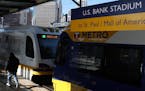 A Green Line light-rail train waited for passengers at the U.S. Bank Stadium station. The Green Line has run 24 hours a day, but a proposal is looking