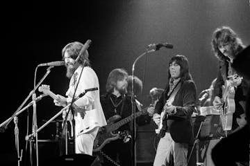 George Harrison, left, performs at the Concert for Bangladesh in Madison Square Garden in 1971, with left to right: Klaus Voormann (bass), Jesse Ed Da
