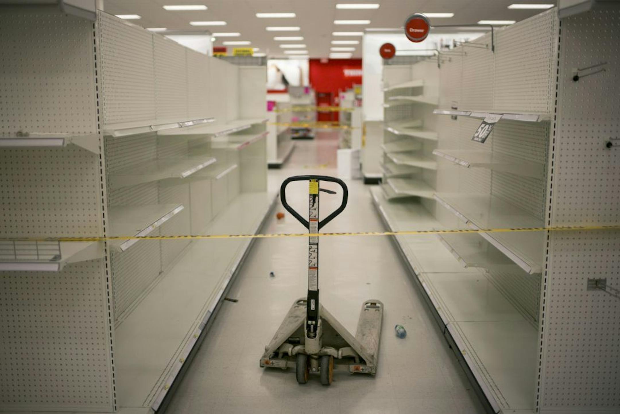FILE � A pallet jack sits in aisles closed off during the final days of operation at a Target in Toronto, one of 133 the retailer has closed in Canada, April 2, 2015. Target�s unorthodox use of bankruptcy provisions to retreat from its Canadian operations after only two years has angered many creditors.