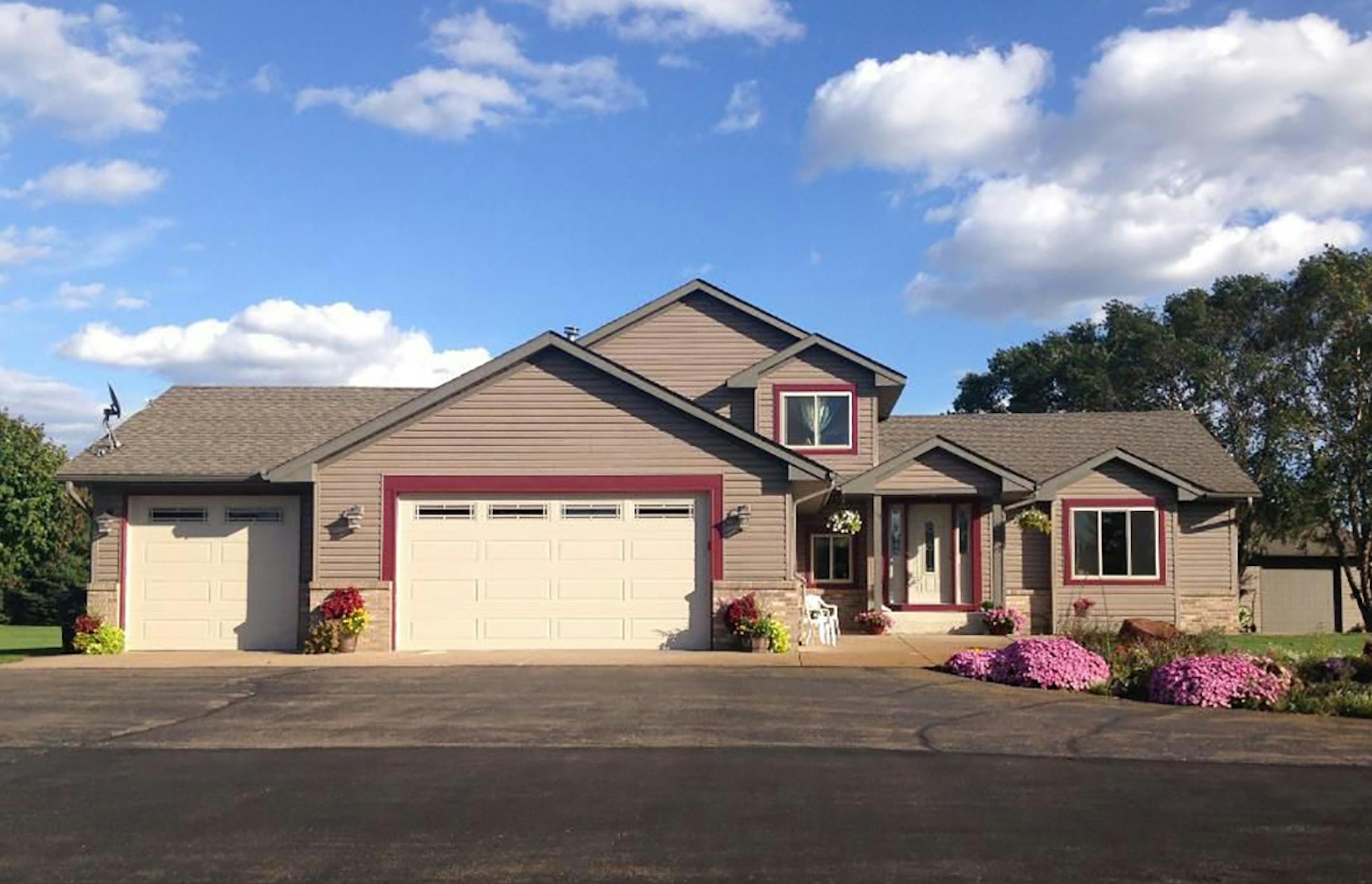 Columbus
Built in 1995, this four-bedroom, three-bath house has 2,212 square feet and features three bedrooms on one level, vaulted ceilings, hardwood floors, eat-in kitchen with quartz countertops and breakfast bar, insulated heated attached garage, and three-car detached garage on a lot with two ornamental ponds. Listed by Steve Gaffney, LaBelle Real Estate Group Inc., 651-485-6196.