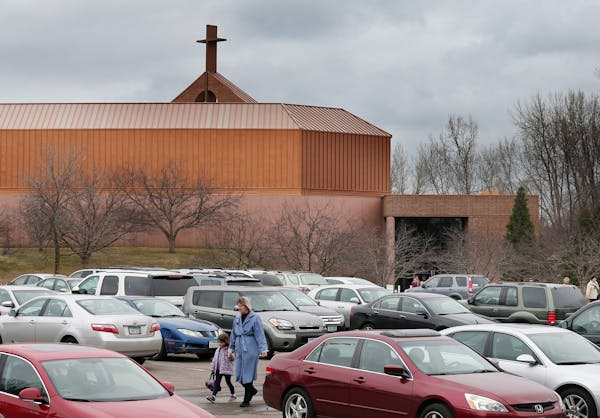 Parishioners walked to their cars after attending the last worship services at North Heights Lutheran Church Sunday March 13, 2016 in Arden Hills, MN.