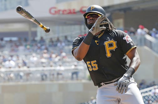 Josh Bell of the Pirates tossed his bat after walking in the third inning Wednesday.