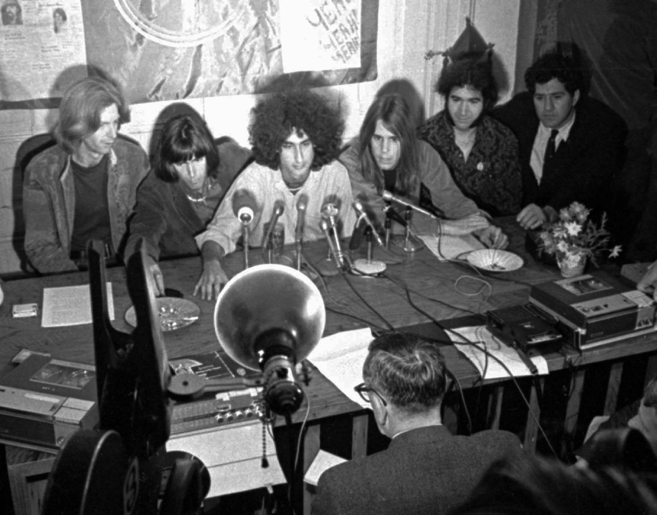 FILE - Members of the Grateful Dead face reporters in San Francisco Oct. 5, 1967, following a police raid on their residence resulting in marijuana possession charges. From left: Bill Kreutzmann, Phil Lesh, Managers Rock Scully and Dan Rifkin, Bob Weir, Jerry Garcia and attorney Michael Stepanion. Garcia died Wednesday, Aug. 9, 1995 of an apparent heart attack at the age of 53.
