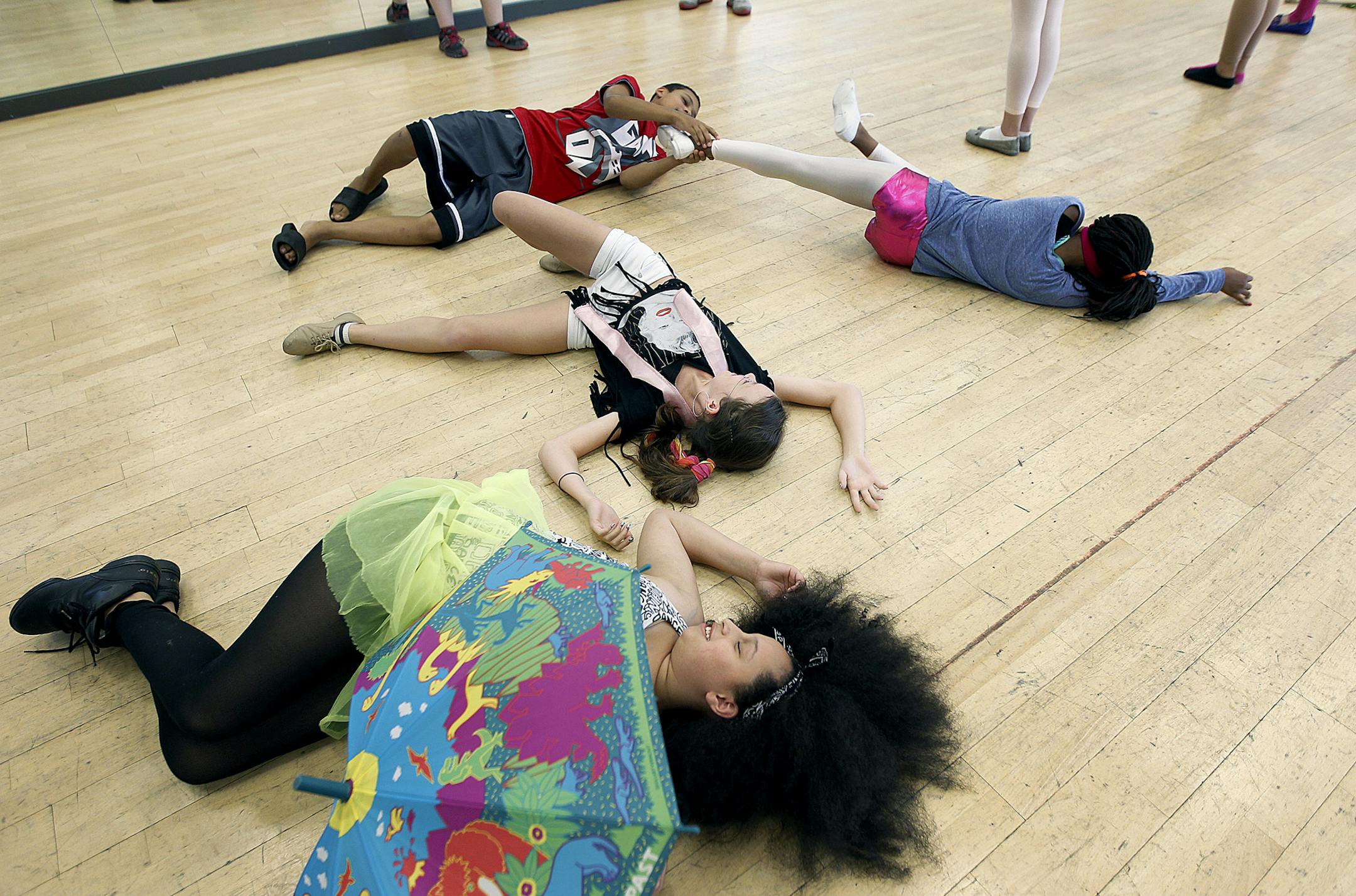Minika Warden, 13, left, participated with other students in an opera camp created by the Lundstrum Center for the Performing Arts and Mill City opera company, Tuesday, July 18, 2013 in Minneapolis, MN. The group created opera based on a children's storybook. (ELIZABETH FLORES/STAR TRIBUNE) ELIZABETH FLORES • eflores@startribune.com