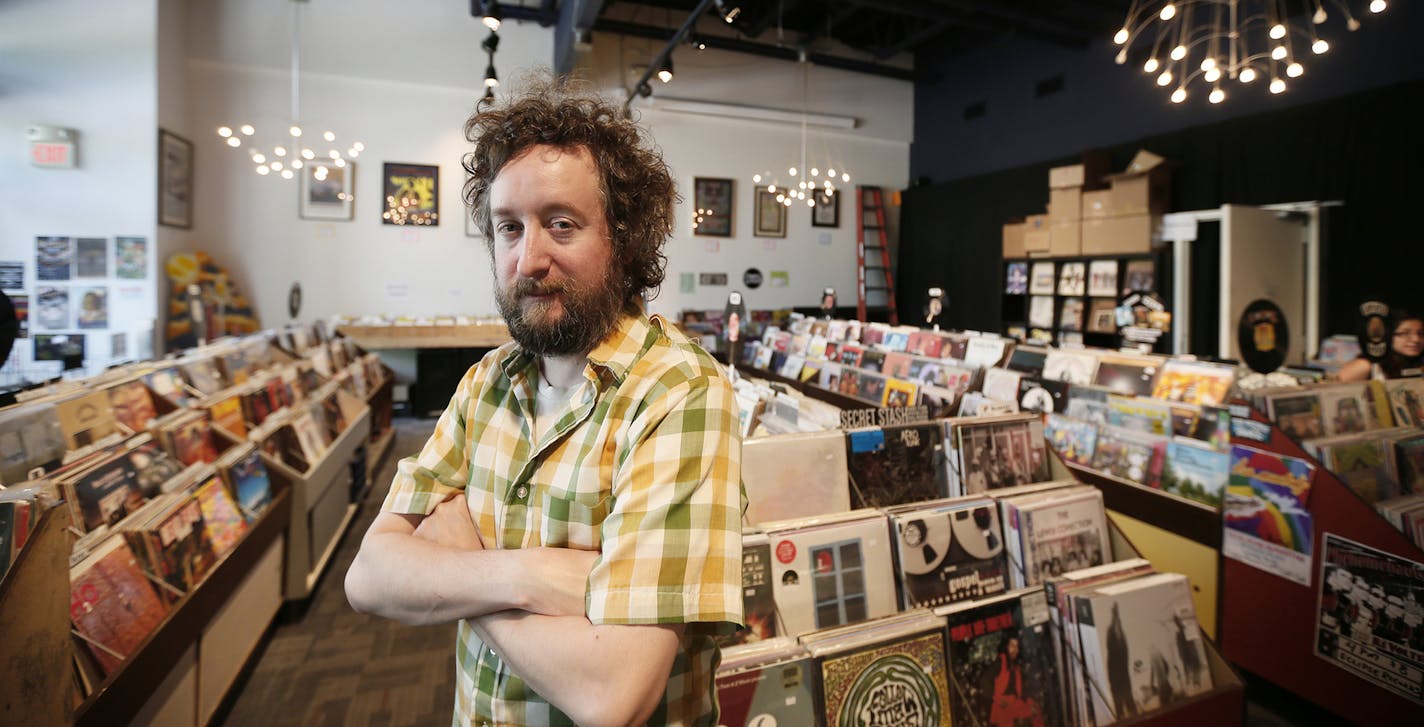 EclipseRecords _ Martin Devaney, manager at Eclipse Records in St. Paul, hopes that people&#x201a;&#xc4;&#xf4;s appreciation for having an album or CD rather than digital media will help stores like his survive. Photo by Simone Cazares