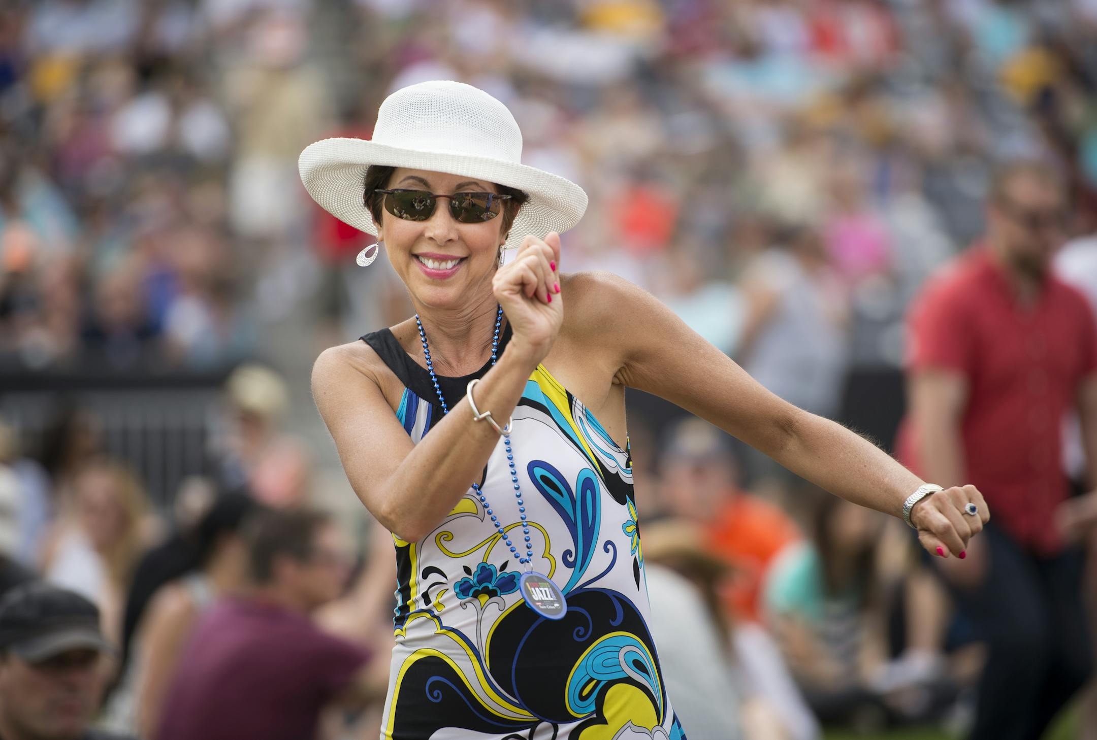 Marni Hockenberg, of Minnetonka, danced along with the music of the Jack Brass Band Saturday at CHS Field. ] Aaron Lavinsky • aaron.lavinsky@startribune.com Dr. John performed Saturday, June 27, 2015 at CHS Field in St. Paul.