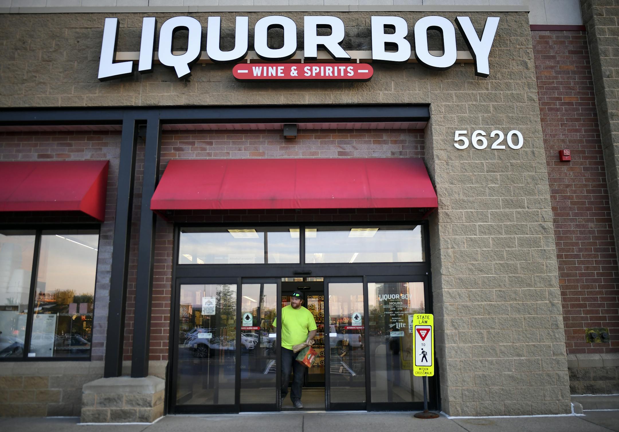 Charlie Noyed, of Crystal, left Liquor Boy Wednesday night after purchasing a bottle of High West Whiskey and a twelve pack of Summit Oktoberfest. ] AARON LAVINSKY • aaron.lavinsky@startribune.com Liquor Boy, the discount liquor store in St. Louis Park since 2012, has been sold. Owner John Wolf was one of the few to take on all competitors, including Total Wine. We photograph business at Liquor Boy just before closing time on Wednesday, August 29, 2018 in St. Louis Park.