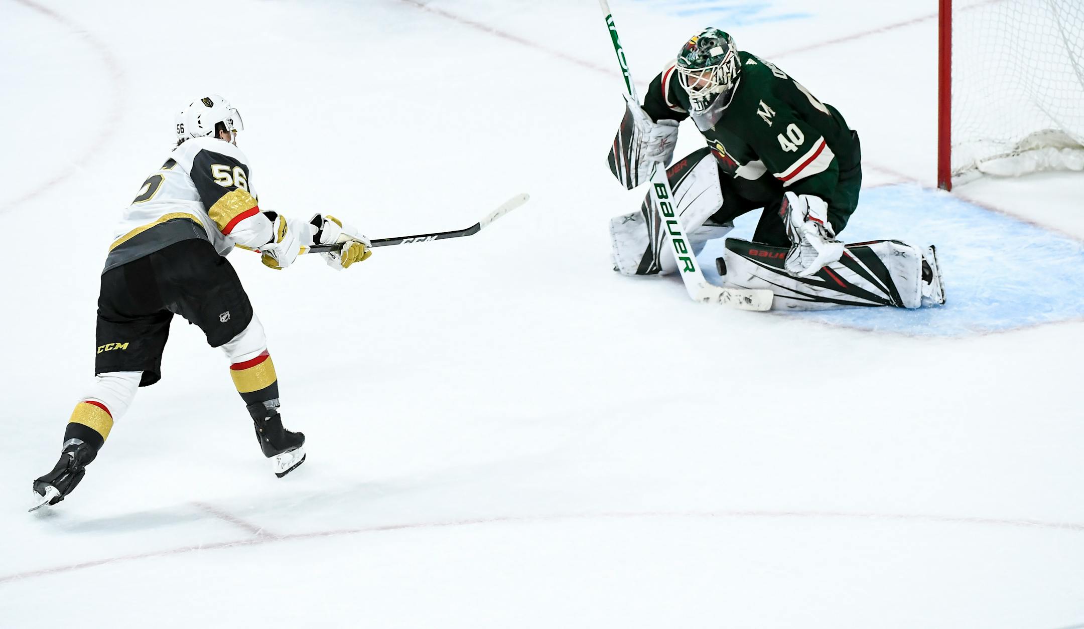 Vegas' Erik Haula scores the game-winning goal against the Wild's Devan Dubnyk during a shootout on Saturday