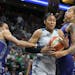 Minnesota Lynx forward Maya Moore (23) was fouled in the first half by Phoenix Mercury forward Monique Currie (25) left at Xcel Energy Center on Tuesd