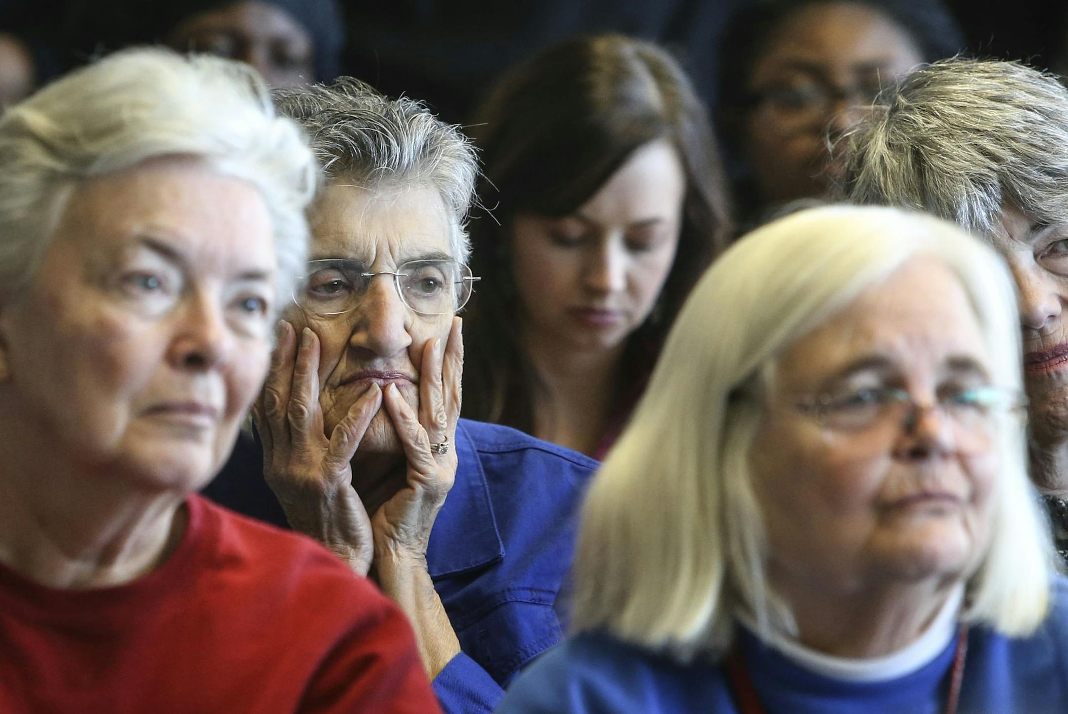 Audience members take in speakers, including Amie Ruth, left to right, of Savanah, GA, and Mary Anderson of St. Paul, as Minnesota Housing announced funding awards of nearly $162 million for affordable housing Wednesday, Oct. 23, 2014, at the Habitat for Humanity offices in St. Paul, MN.](DAVID JOLES/STARTRIBUNE)djoles@startribune.com Minnesota Housing unveils record funding awards of $162 million for affordable housing projects across Minnesota. Project will create or preserve housing for 4,000