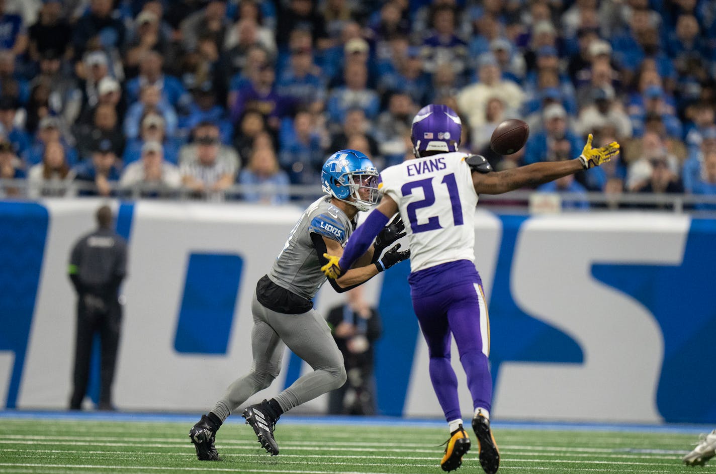 Detroit Lions wide receiver Amon-Ra St. Brown (14) beat Minnesota Vikings cornerback Akayleb Evans (21) for a 70 yard fourth quarter touchdown catch Sunday January ,7 2024 in, Detroit, Mich. ] JERRY HOLT • jerry.holt@startribune.com