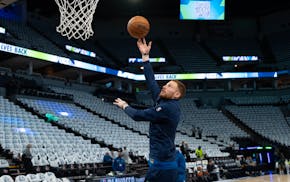 Timberwolves guard Donte DiVincenzo (0) warmed up early before the facing the Golden State Warriors in Game 5 of their NBA Western Conference playoff