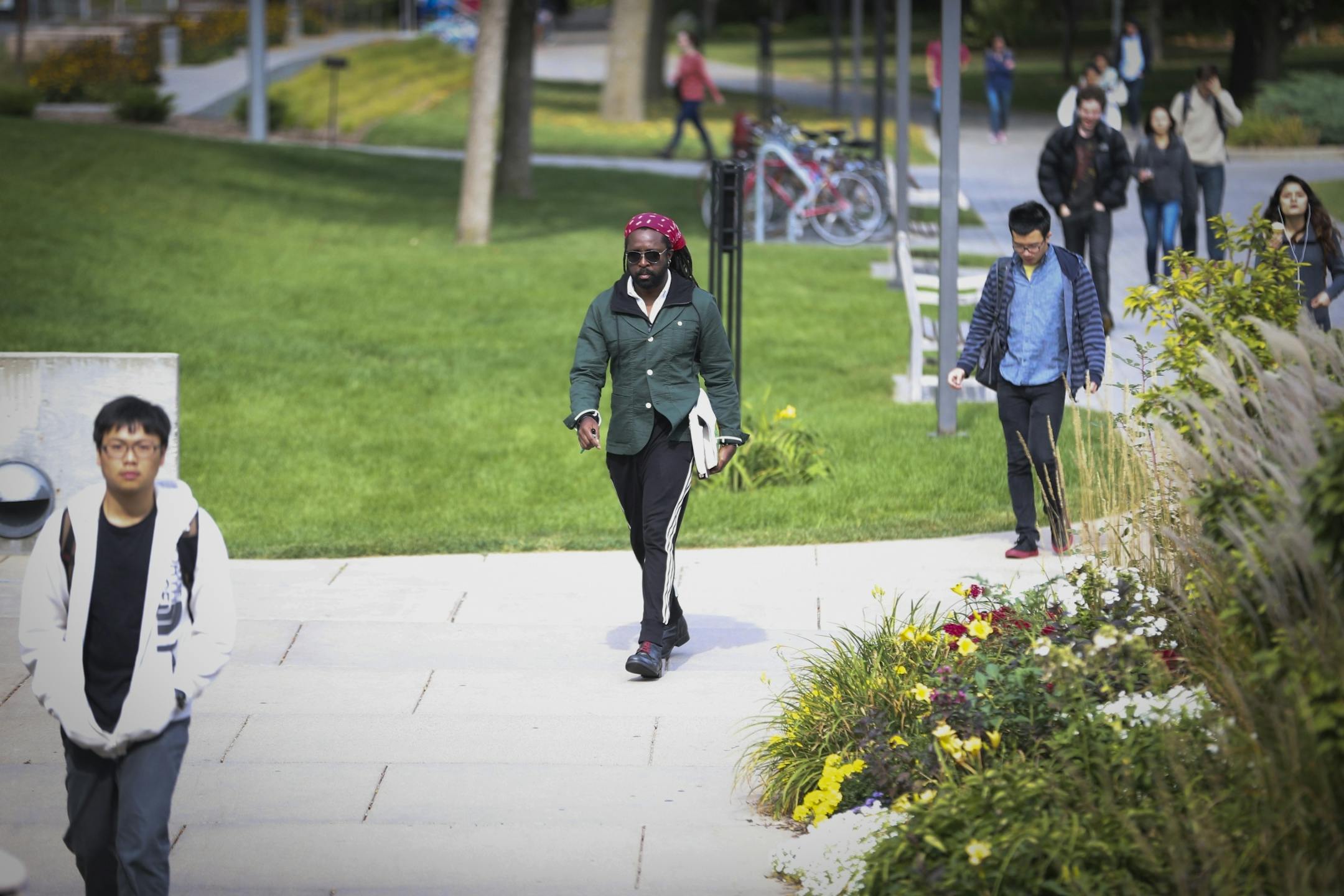 Author Marlon James walked to a class he teaches on Macalester College campus on Tuesday, September 30, 2014 in St. Paul, Minn.