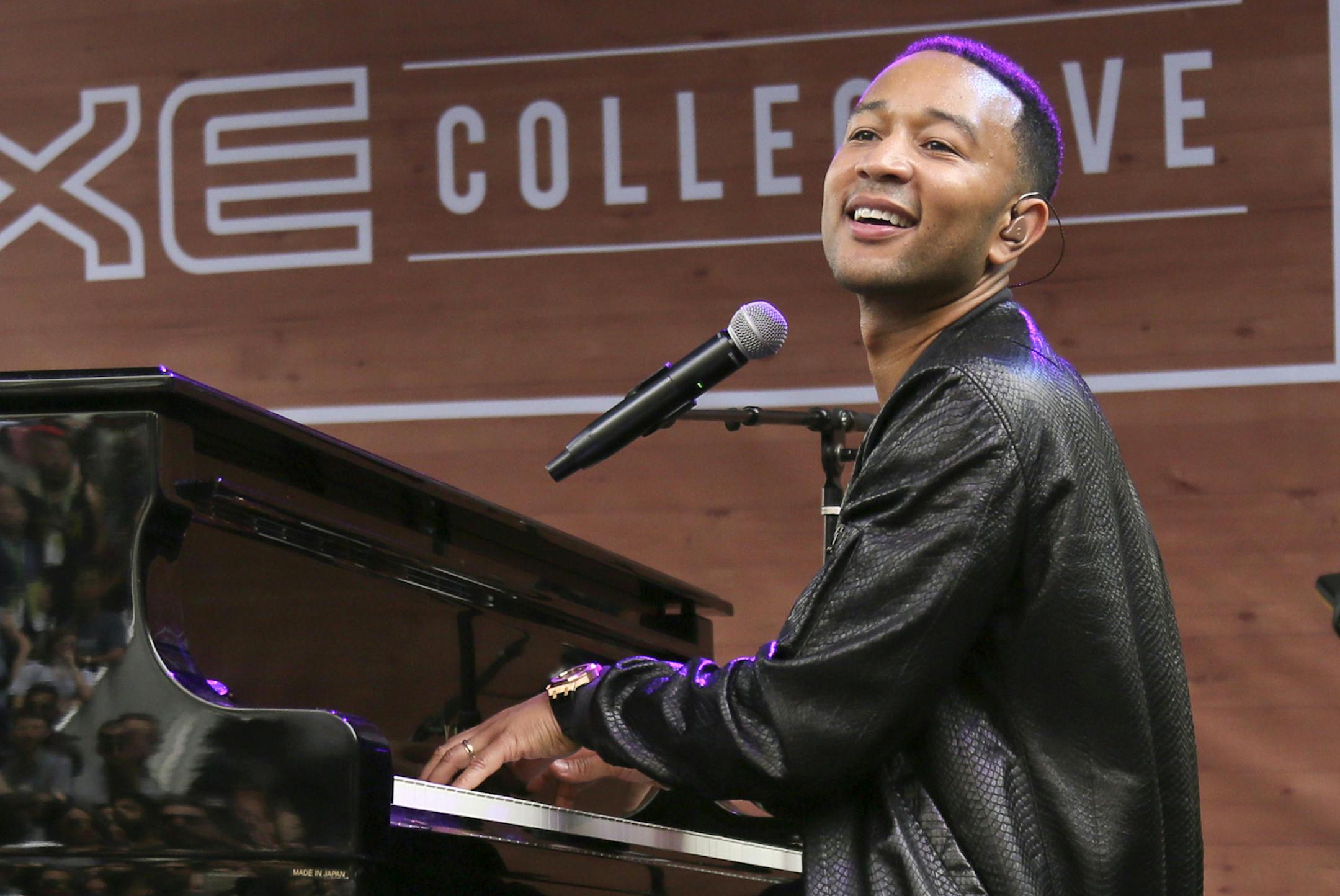 FILE - In this March 17, 2016, file photo, John Legend performs during the South by Southwest Music Festival in Austin, Texas. The Springfield School District in Springfield, Ohio is nearing completion on its newly renovated John Legend Theater, and officials are trying to determine how it will be shared with the community. The $2.5 million project is expected to be completed by September. Legend donated $500,000 for the project. The Oscar- and Grammy-winning artist is a graduate of the Springfi