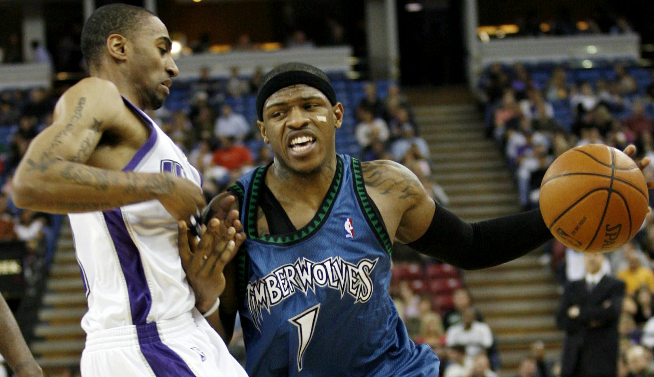 Minnesota Timberwolves' Rashad McCants (1) tries to drive around the Sacramento Kings' Quincy Douby in the first half of an NBA basketball game, Friday, March 7, 2008, in Sacramento, Calif.