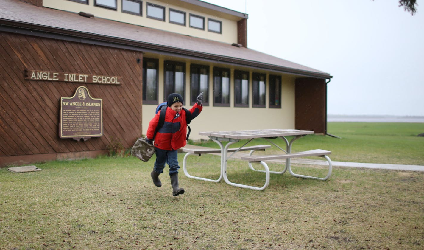 At school&#x2019;s end, Tyson McKeever heads to a nearby tree to climb while waiting for a ride home at Minnesota&#x2019;s last public, one-room school.