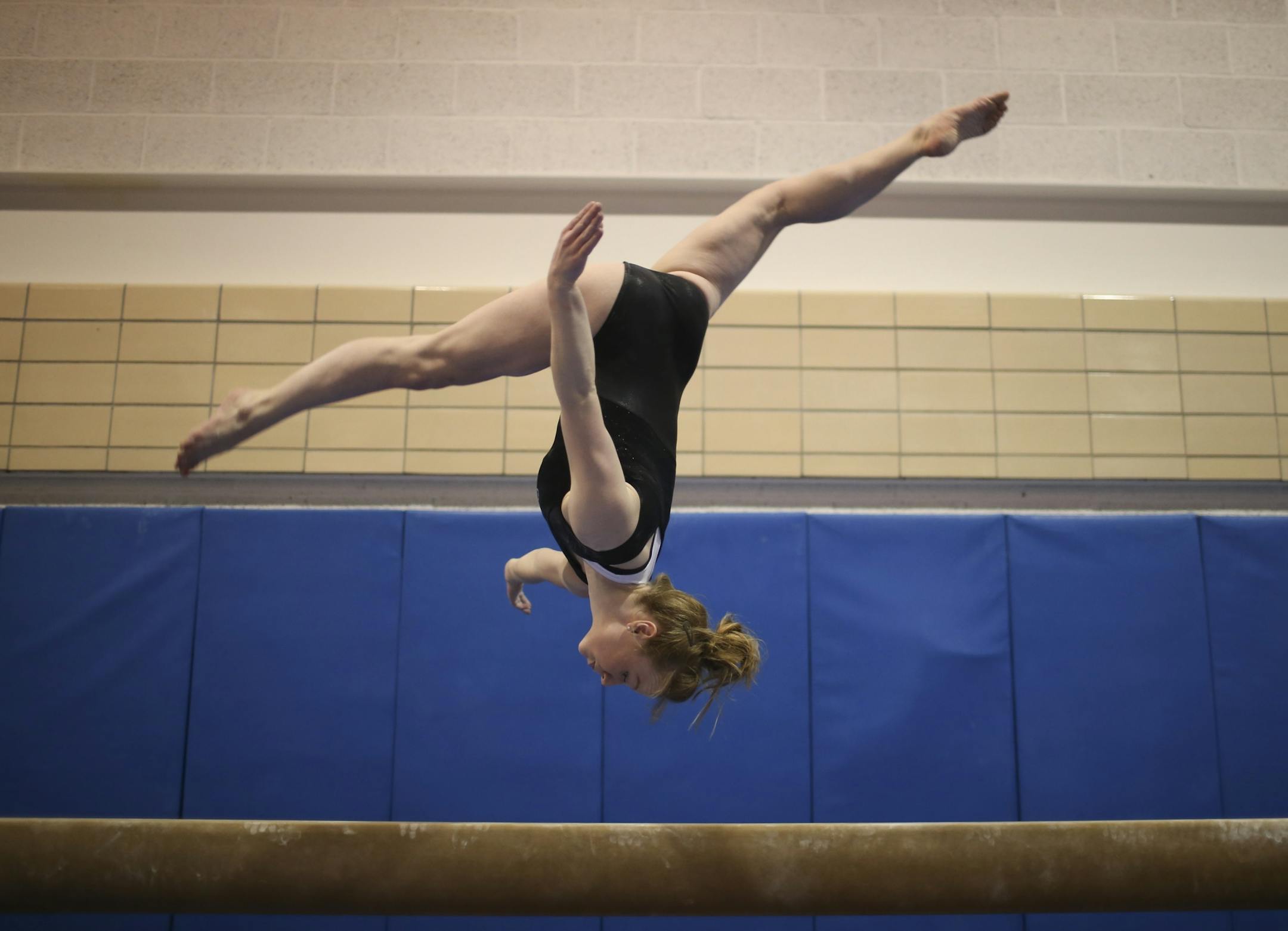Freshman Lindsay Mable practiced her routine on the balance beam in the Peik Hall gym Tuesday afternoon