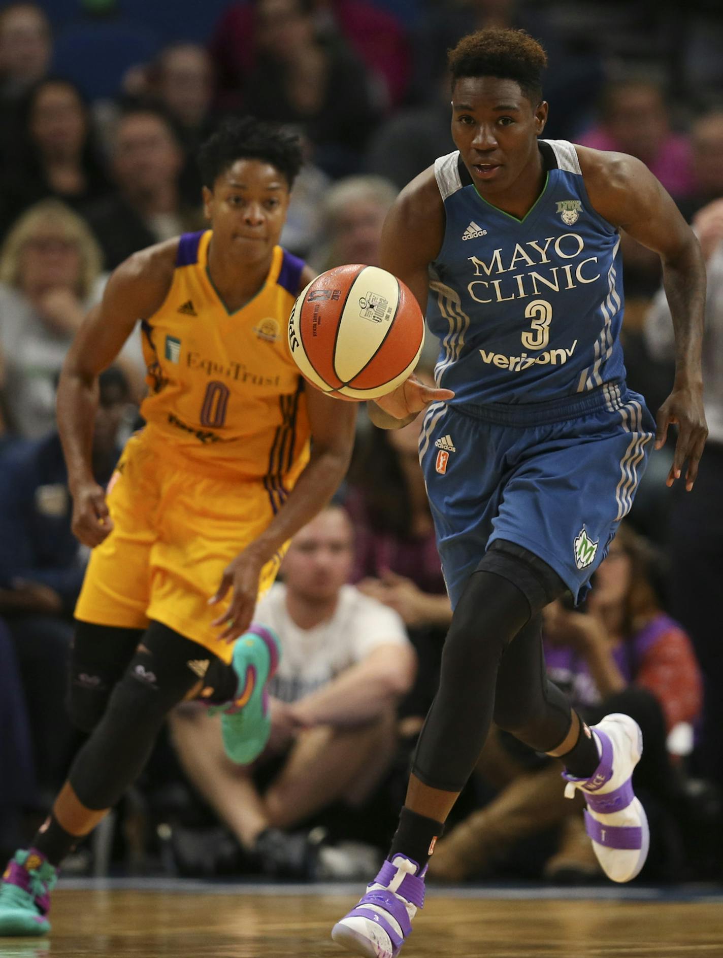 Minnesota Lynx forward Natasha Howard (3) grabbed a loose ball ahead of Los Angeles Sparks forward Candace Parker (3) Tuesday night. ] JEFF WHEELER &#xef; jeff.wheeler@startribune.com The Minnesota Lynx beat the Los Angeles Sparks 79-60 in Game 2 of their WNBA Championship series Tuesday night, October 11, 2016 at Target Center in Minneapolis.