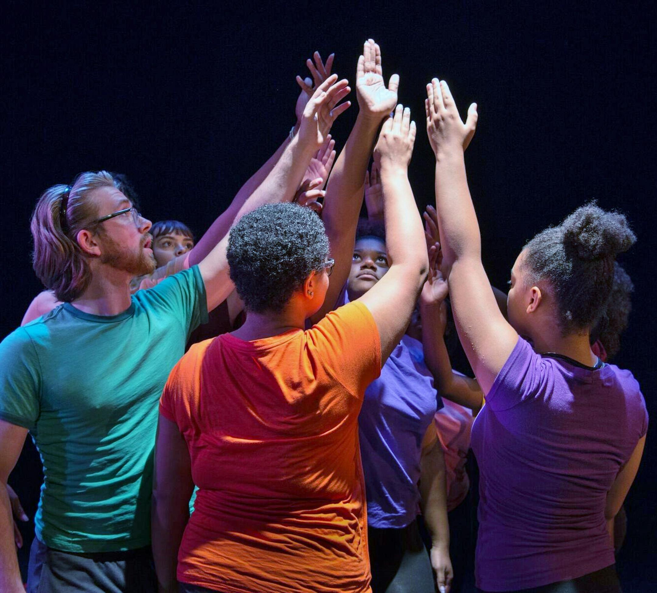 provided by Penumbra Theatre Summer Institute students form a pyramid at Penumbra.