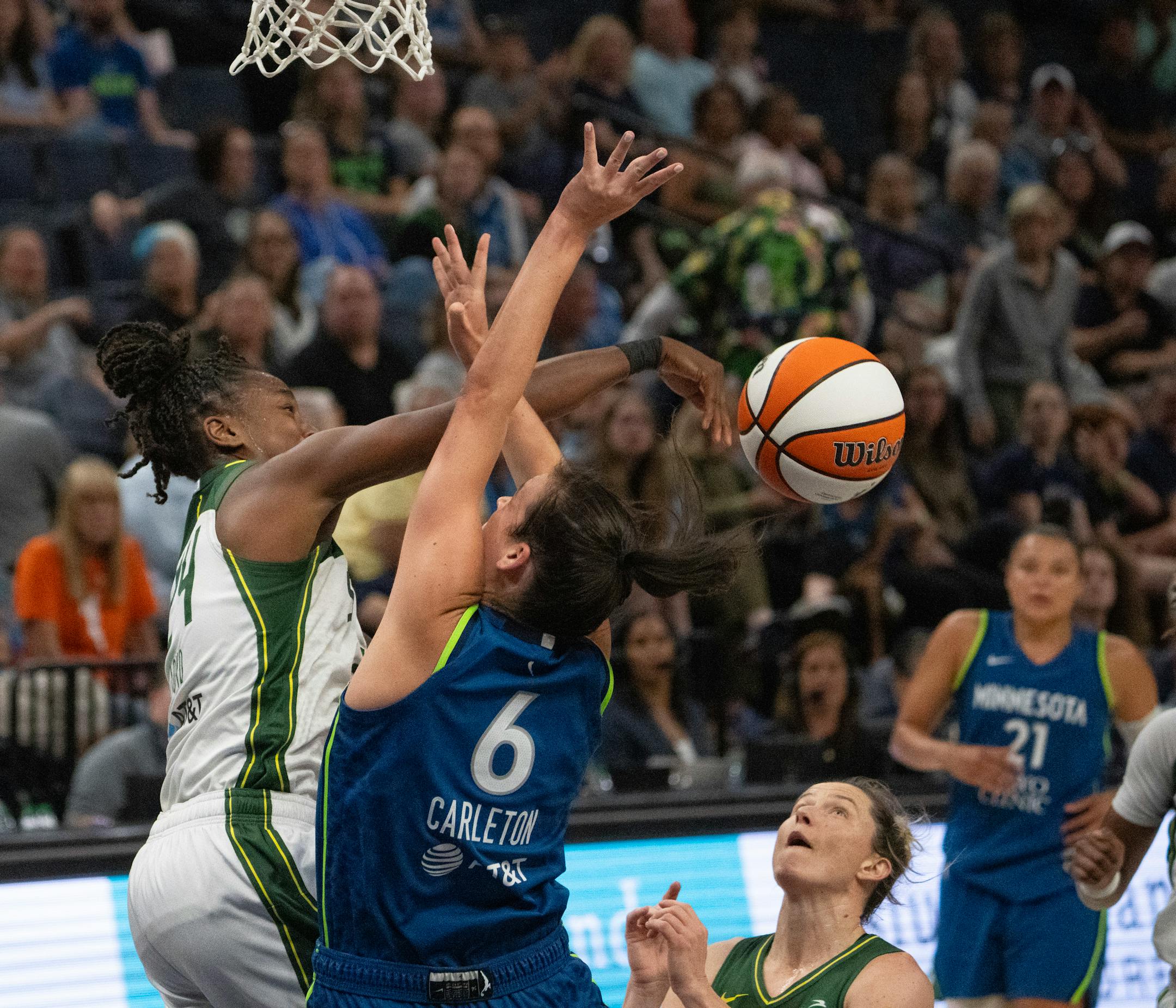 Minnesota Lynx forward Bridget Carleton had her shot blocked by Seattle Storm guard Jewell Loyd in the third quarter.