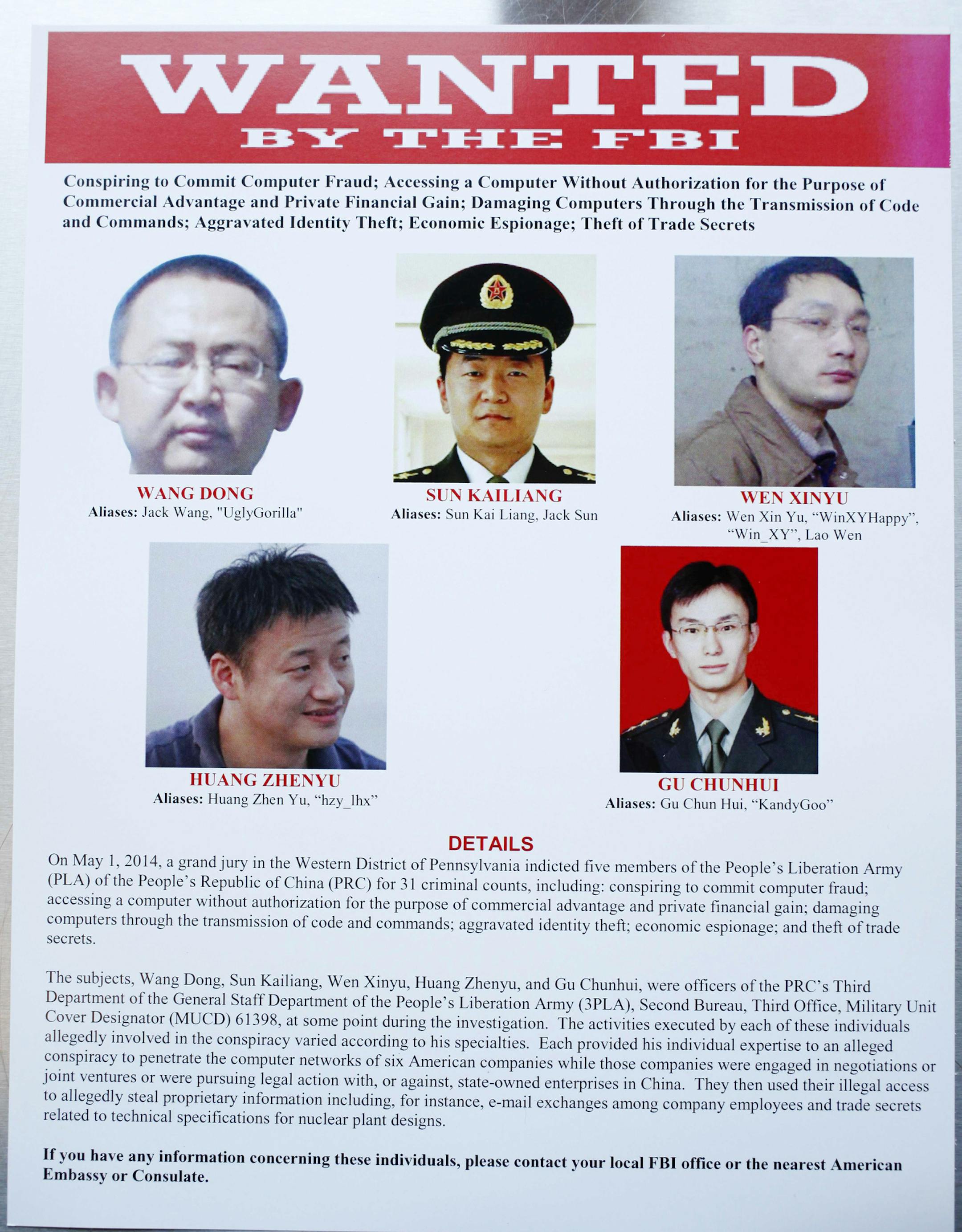 In a Justice Department handout photo, a wanted poster for five Chinese hackers charged with economic espionage and trade secret theft, released in Washington, May 19, 2014. The men are accused of being part of a Chinese military unit that has hacked the computers of prominent American companies to steal commercial secrets.(Justice Department via The New York Times) -- EDITORIAL USE ONLY