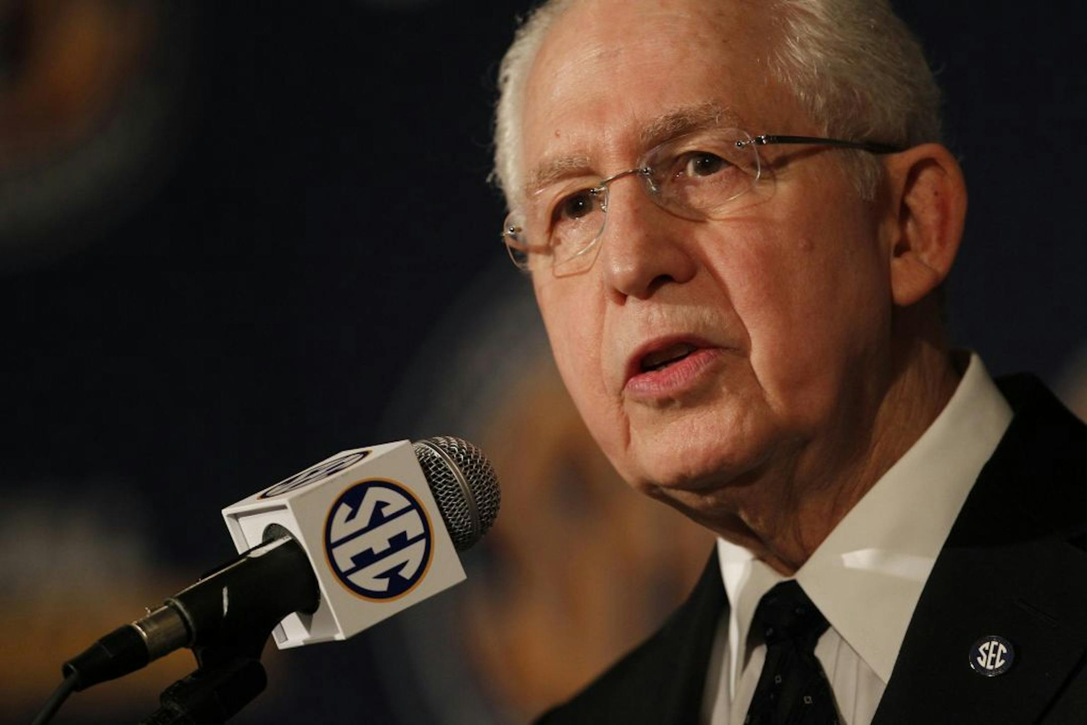 SEC Commissioner Mike Slive talks to media during SEC football media days in Hoover, Alabama, Tuesday, July 16, 2013.