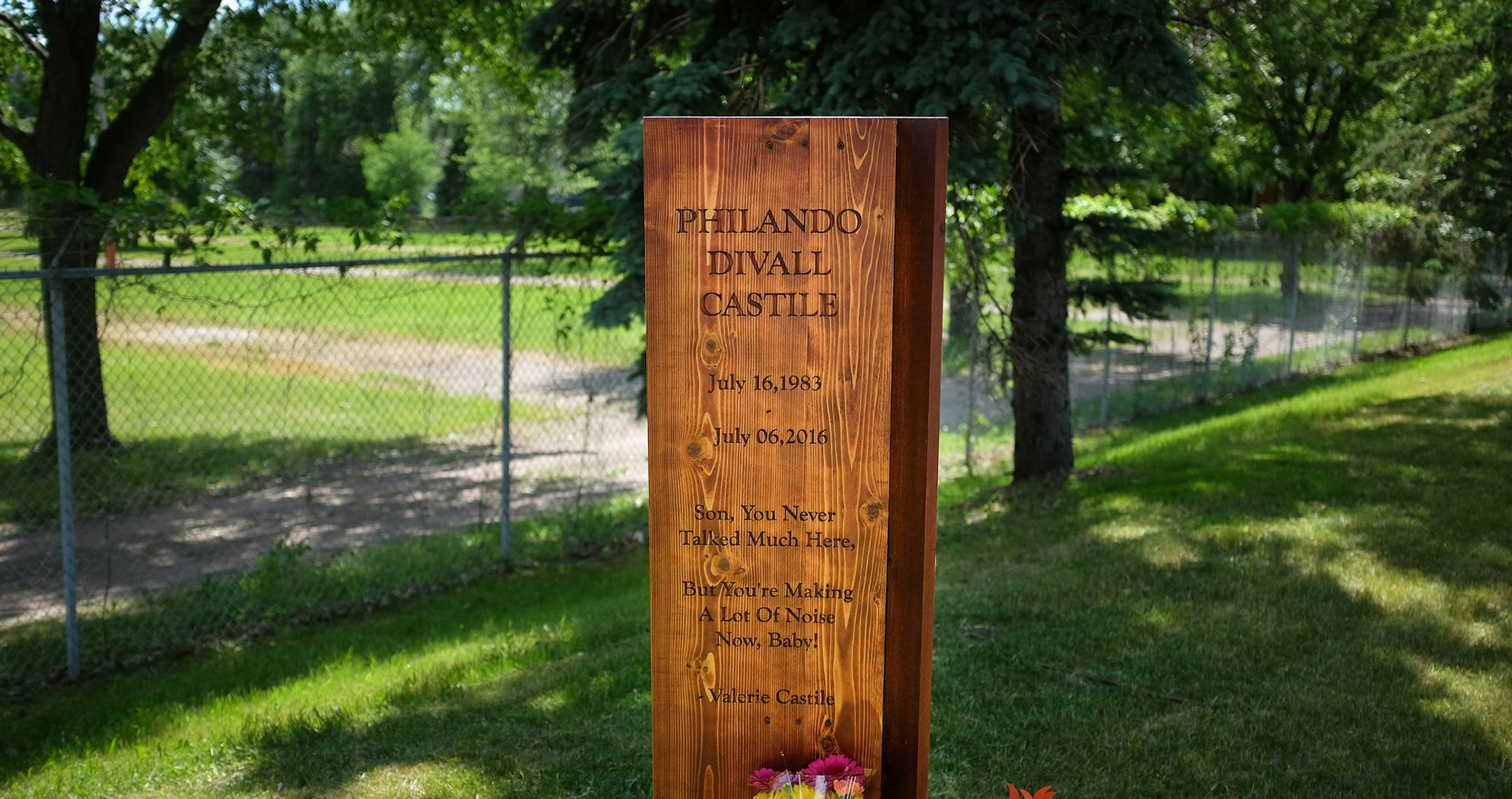 A bouquet of fresh flowers was left at the base of a permanent memorial for Philando Castile near where he was shot and killed last summer in Falcon Heights. ] AARON LAVINSKY ï aaron.lavinsky@startribune.com Memorials were set up near the spot where Philando Castile was shot and killed during a traffic stop by St. Anthony police officer Jeronimo Yanez last summer. Photographed Wednesday, June 14, 2017 in Falcon Heights, Minn. ORG XMIT: MIN1706141533034882