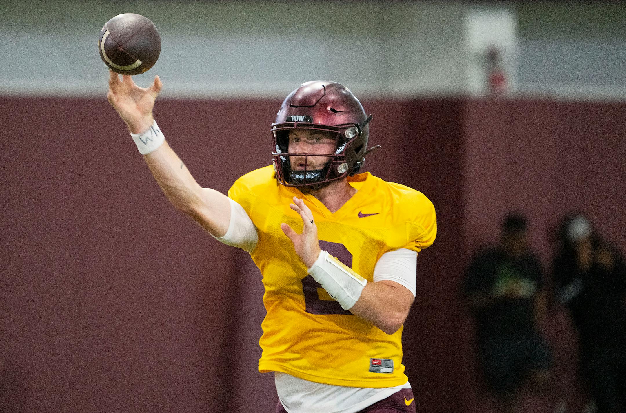 Gophers quarterback Tanner Morgan throws a pass during the football team's open practice Saturday.