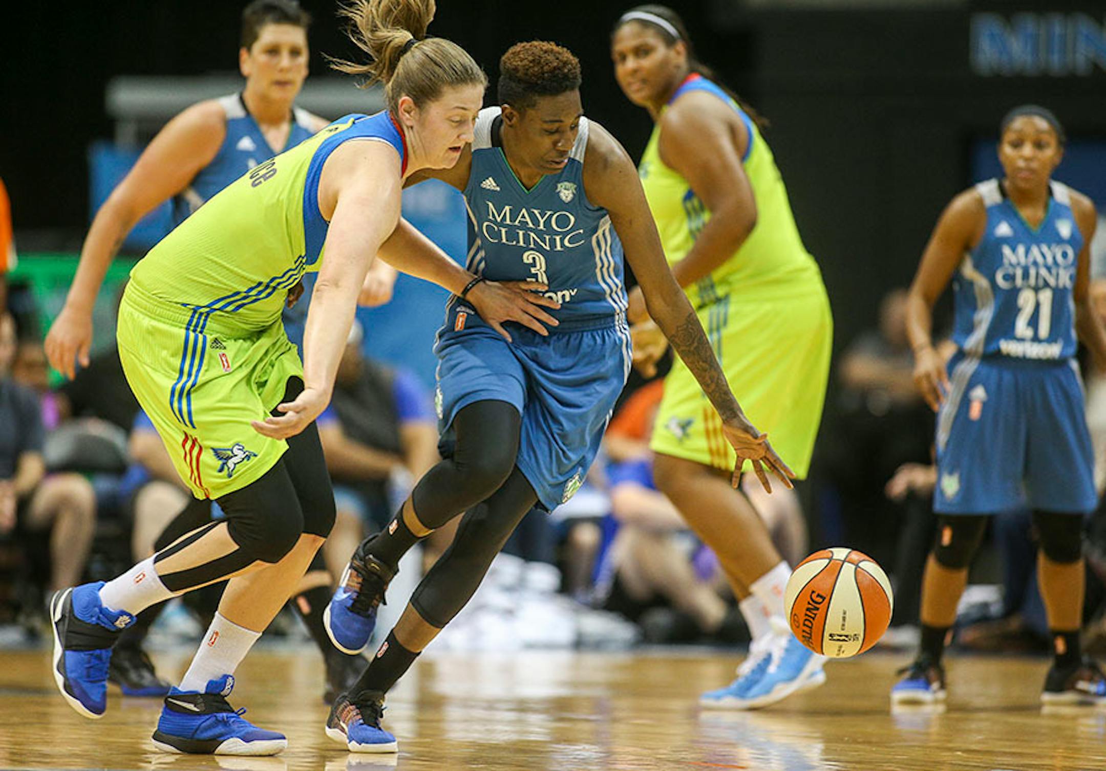 Minnesota Lynx forward Natasha Howard (3) strips the ball from Dallas Wings center Courtney Paris (3).