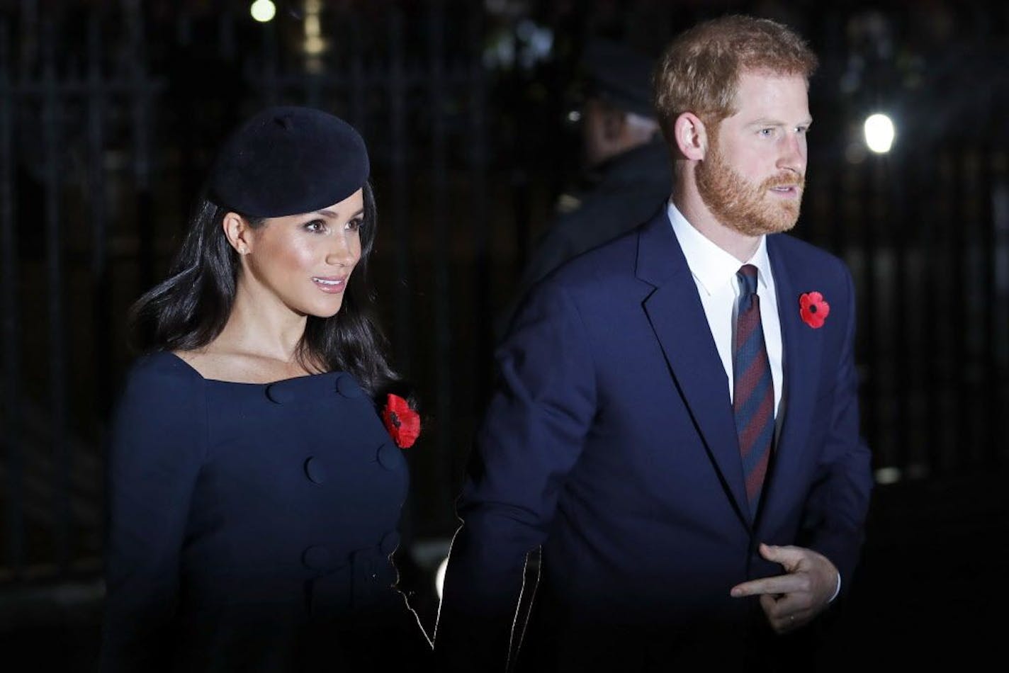 Meghan, Duchess of Sussex, left, and Prince Harry arrive at Westminster Abbey to attend the National Service to mark the Centenary of the Armistice in London, Sunday, Nov. 11, 2018. The cessation of hostilities in WWI ended on the eleventh hour of the eleventh day of the eleventh month,1918.