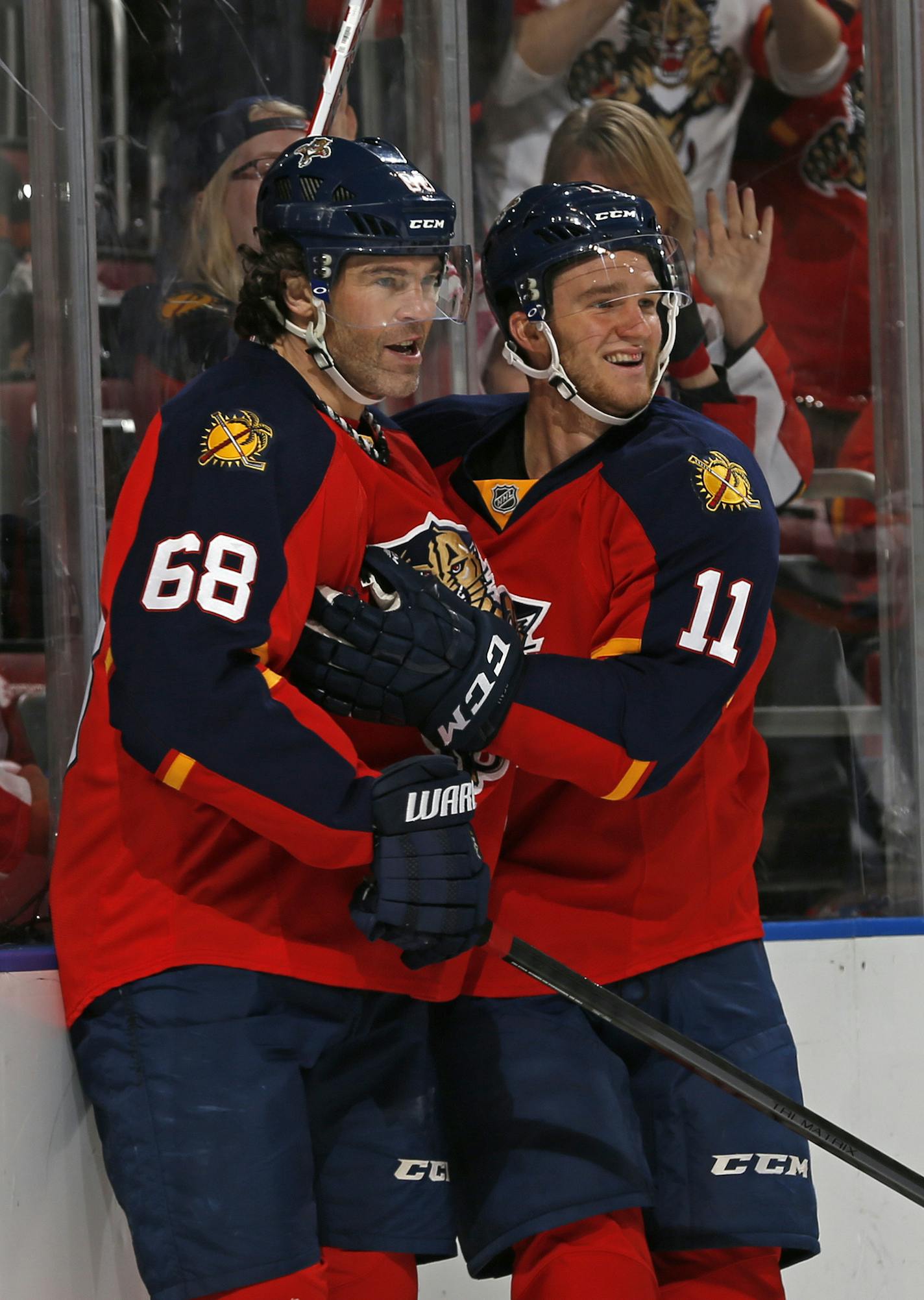 Florida Panthers forward Jaromir Jagr (68) is congratulated by forward Jonathan Huberdeau (11) after he scored a goal against the Minnesota Wild during the first period of an NHL hockey game, Sunday, Jan. 3, 2016, in Sunrise, Fla. (AP Photo/Joel Auerbach)