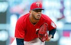 Minnesota Twins pitcher Fernando Romero throws against the Texas Rangers in the first inning of a baseball game Friday, June 22, 2018, in Minneapolis.
