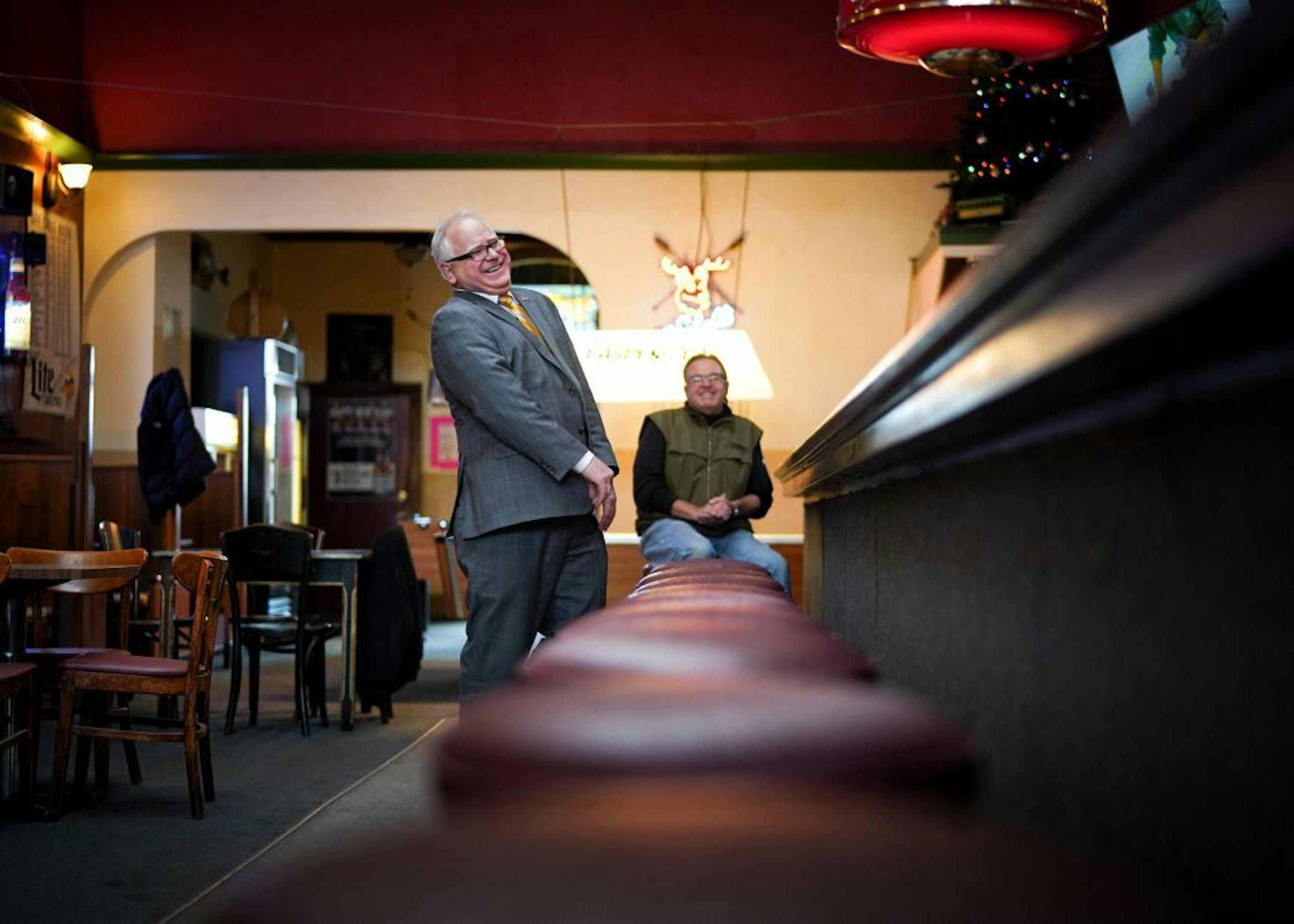 While touring Waseca businesses with Mayor Roy Srp, Minnesota Governor Tim Walz stopped by Barden's Bar on North State St and talked with local business owner Robin Bluhm who stops in Barden's most mornings for coffee.