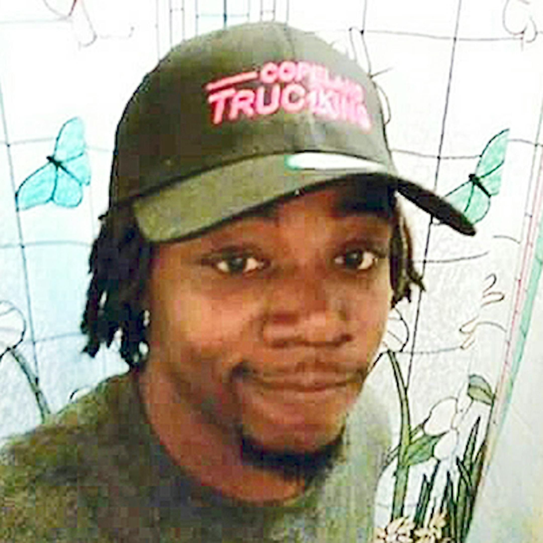 FILE - This undated photo released by Javille Burns shows her brother, Jamar Clark, who was fatally shot in a confrontation with police on Sunday, Nov. 15, 2015, in Minneapolis. The officers, Mark Ringgenberg and Dustin Schwarze, were trying to arrest Clark when he was shot once in the head. He died a day later. Some witnesses said Clark was handcuffed when he was shot, but federal and state probes concluded that he was not. Investigators said Ringgenberg felt Clark's hand trying to grab his wea