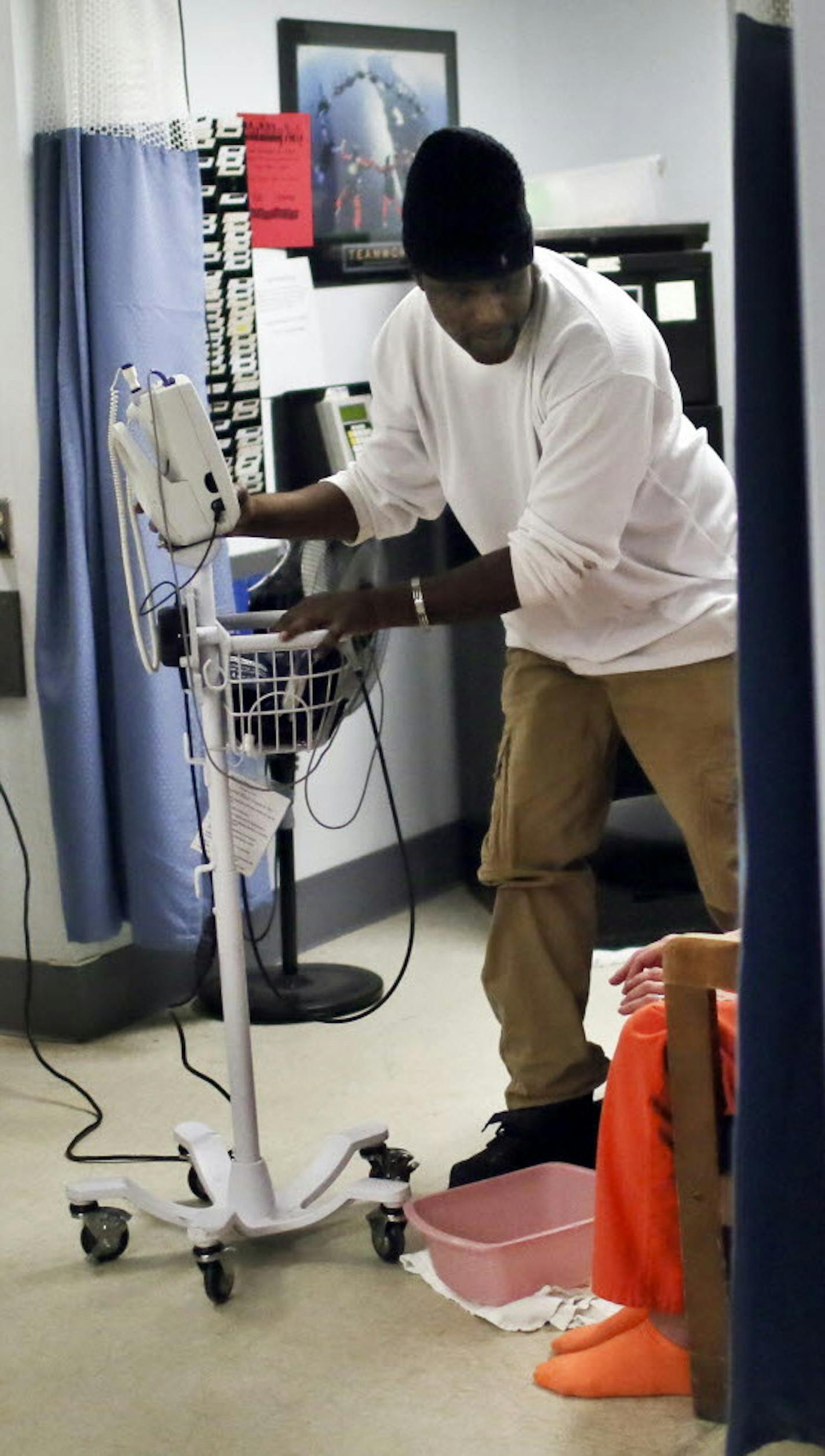 File photo of the Hennepin County Detox Center, where healthcare assistant Sidney McVay prepared to take the vital signs of a woman who was brought into the center and was distraught and in pain Wednesday, Dec. 5, 2013.