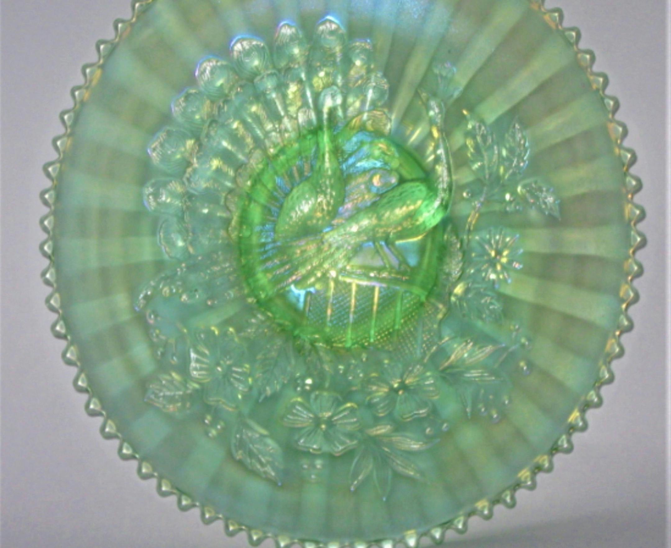 A very nice piece of carnival glass, but is it an original?