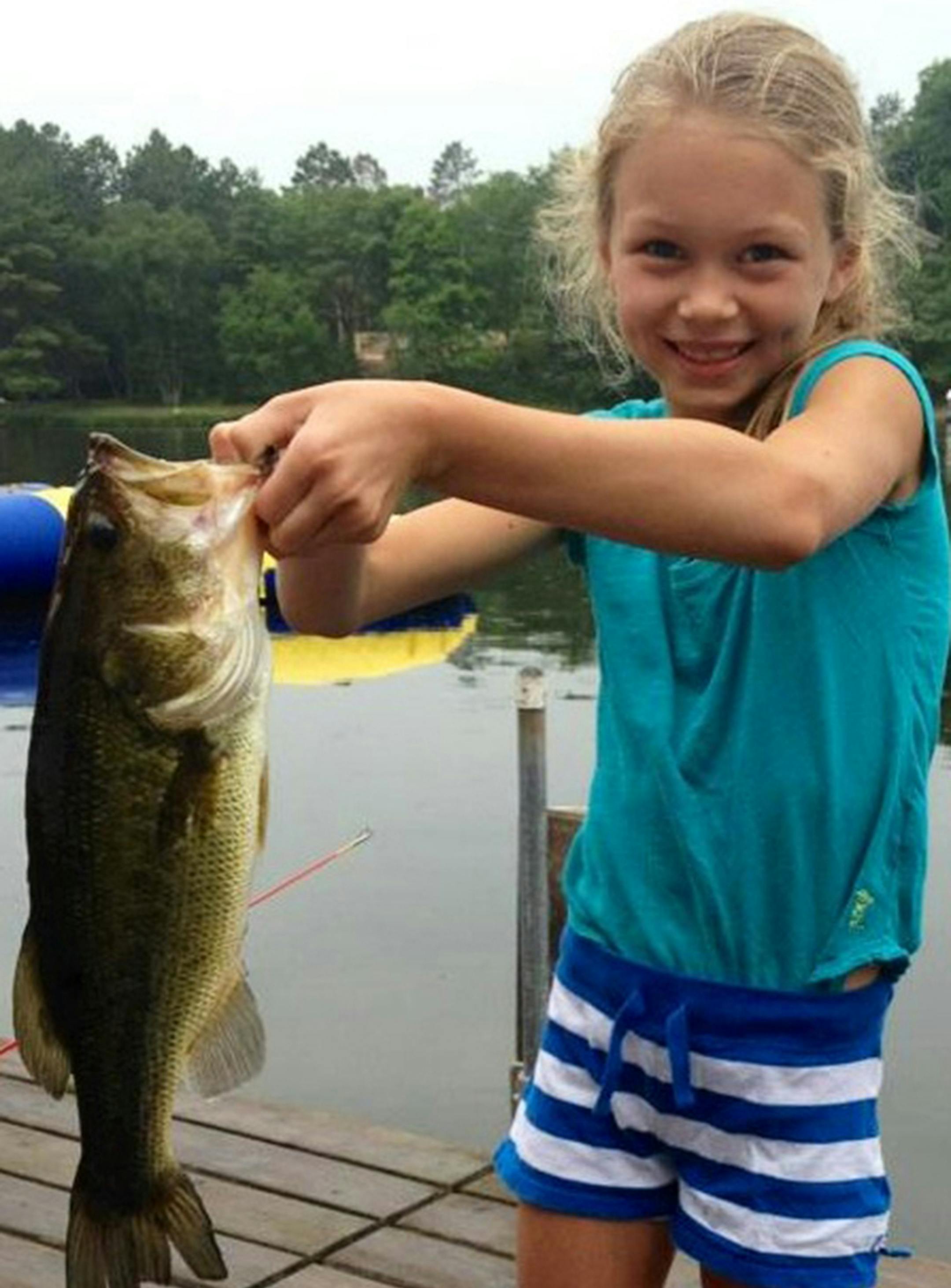 HOOKED ON FISHING Sami Hankinson, 8, of Edina, caught this 18-inch bass off a dock at Gull Lake. ‚ÄúShe was very proud of her fish, and even more proud that she could hold it,‚Äô‚Äô said her dad, Casey. ‚ÄúI was proud of the catch, but also proud that she put on her own leech to catch it. She released it.‚Äô‚Äô
