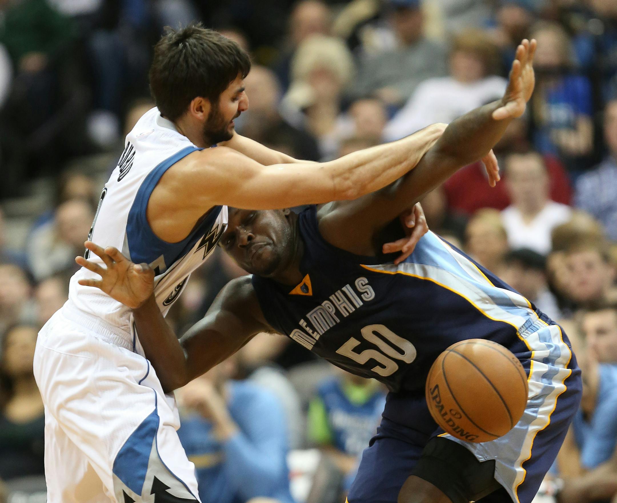 Wolves Ricky Rubio had the ball stolen by Grizzlies Zach Randolph during the second half. ] (KYNDELL HARKNESS/STAR TRIBUNE) kyndell.harkness@startribune.com Wolves vs Grizzlies at the Target Center in Minneapolis, Min., Saturday, February 28, 2015. Grizzlies won 101-97 over the Wolves.