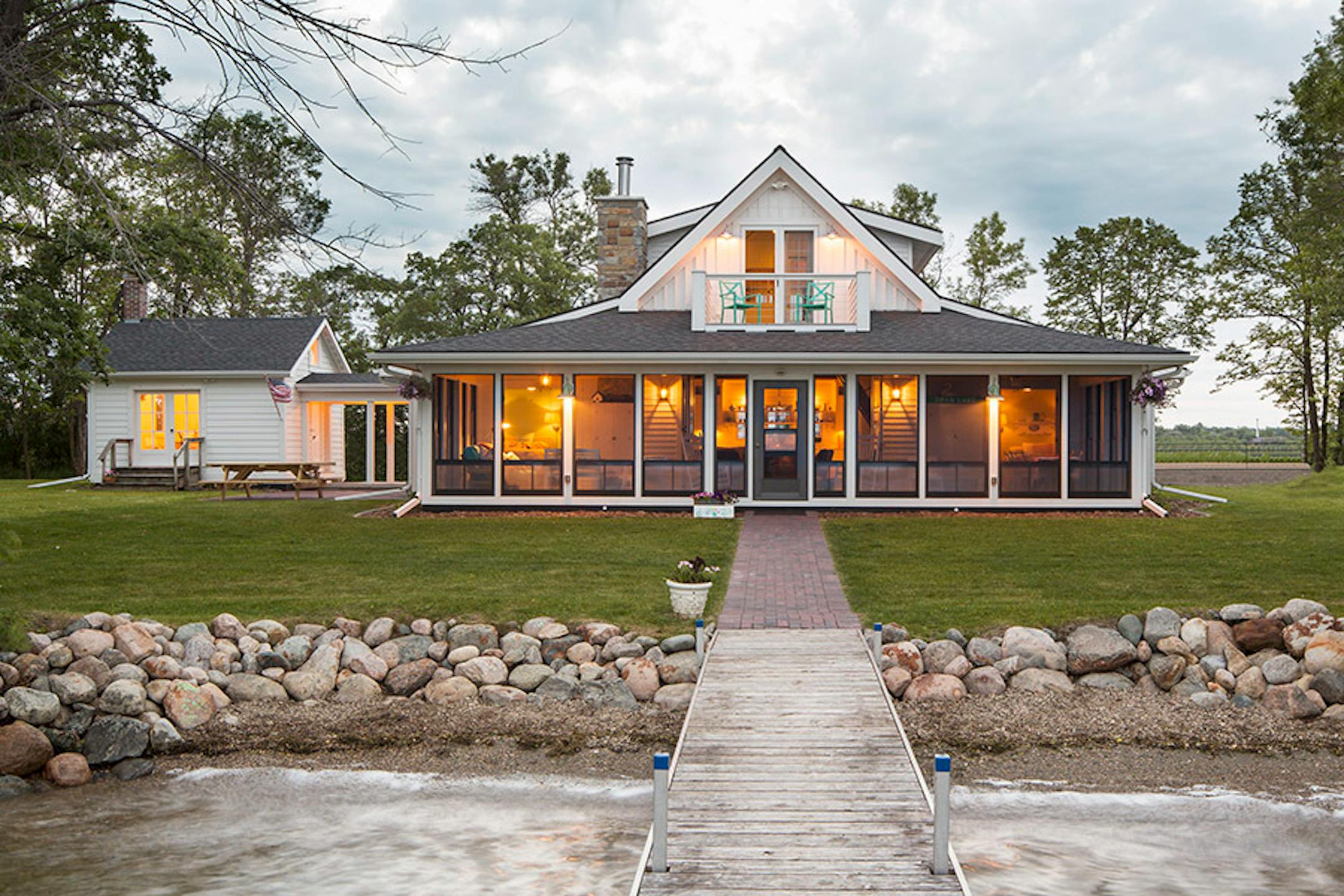 Porch Cabin II. New lake cabin with big screen porch by SALA Architects.