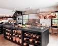 BC-ASK-MARTHA-KITCHEN-MAKEOVER-ART-NYTSF — Martha stores her copper pots and pans on an overhead rack near the stoves, where they are always easy to