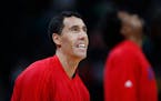 Los Angeles Clippers guard Pablo Prigioni (9) warms up before facing the Denver Nuggets in the first half of an NBA basketball game Tuesday, Nov. 24, 
