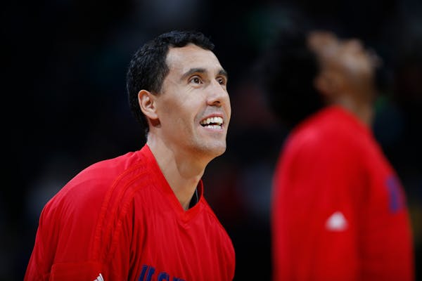 Los Angeles Clippers guard Pablo Prigioni (9) warms up before facing the Denver Nuggets in the first half of an NBA basketball game Tuesday, Nov. 24, 