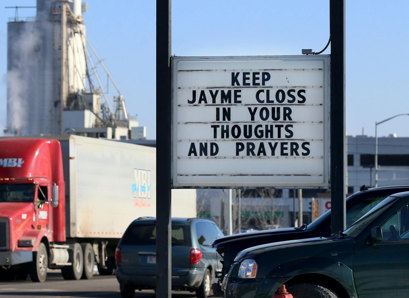 Here, a sign on a business on the main street in town with the Jennie-O Turkey Store plant to the rear, where both James and Denise Closs worked, and seen Wednesday, Nov. 14, 2018, in Barron, Wis.