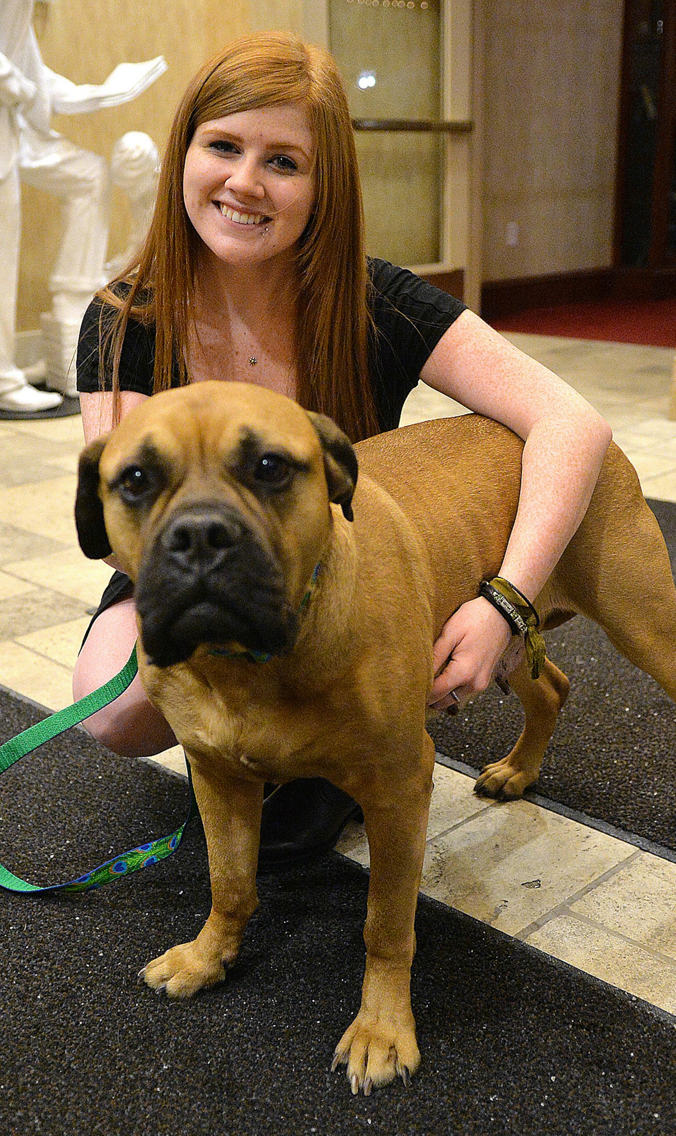 Kendall Spence with Maya, a 4-year-old Bullmastiff. ] (SPECIAL TO THE STAR TRIBUNE/BRE McGEE) **Kendall Spence, Maya (4-year-old Bullmastiff)
